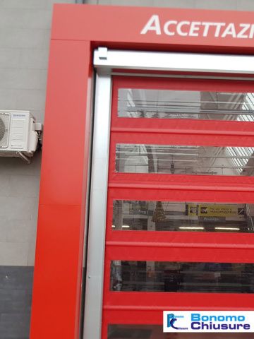 Portone sezionale ad avvolgimento rapido installato in provincia milano monza-brianza